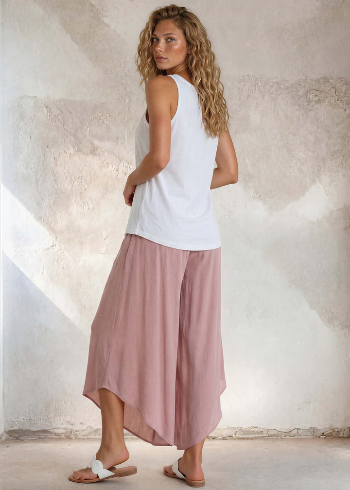 Say it in something made here! USA-made Patriotic Pink USA Flag Graphic tank in white garment wash. Soft 95% cotton, relaxed fit, grown &amp; sewn in America.