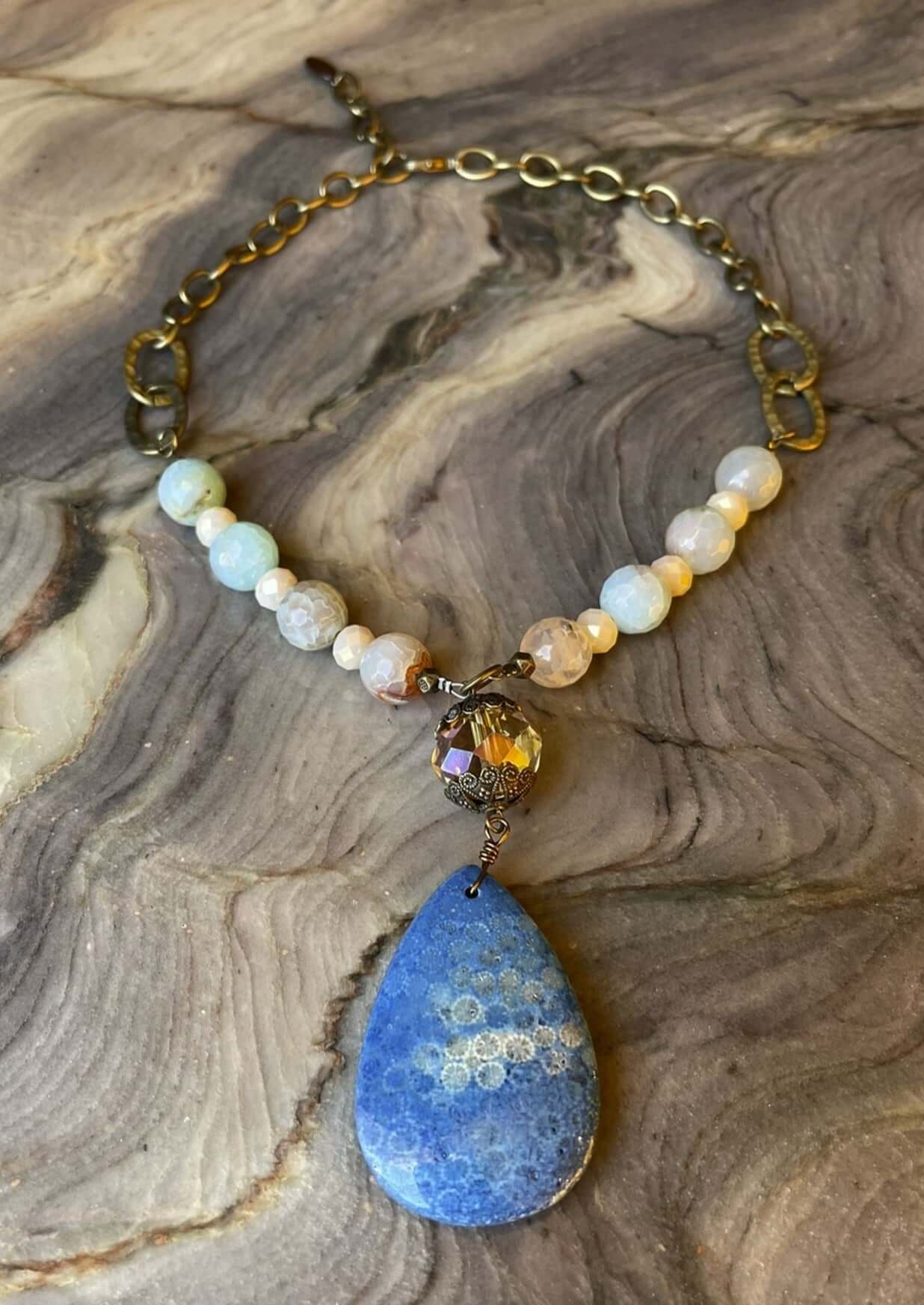 Ladies Fossil Imprinted Natural Blue Stone Statement Necklace. Handmade in USA, This beautiful piece is an adjustable length.