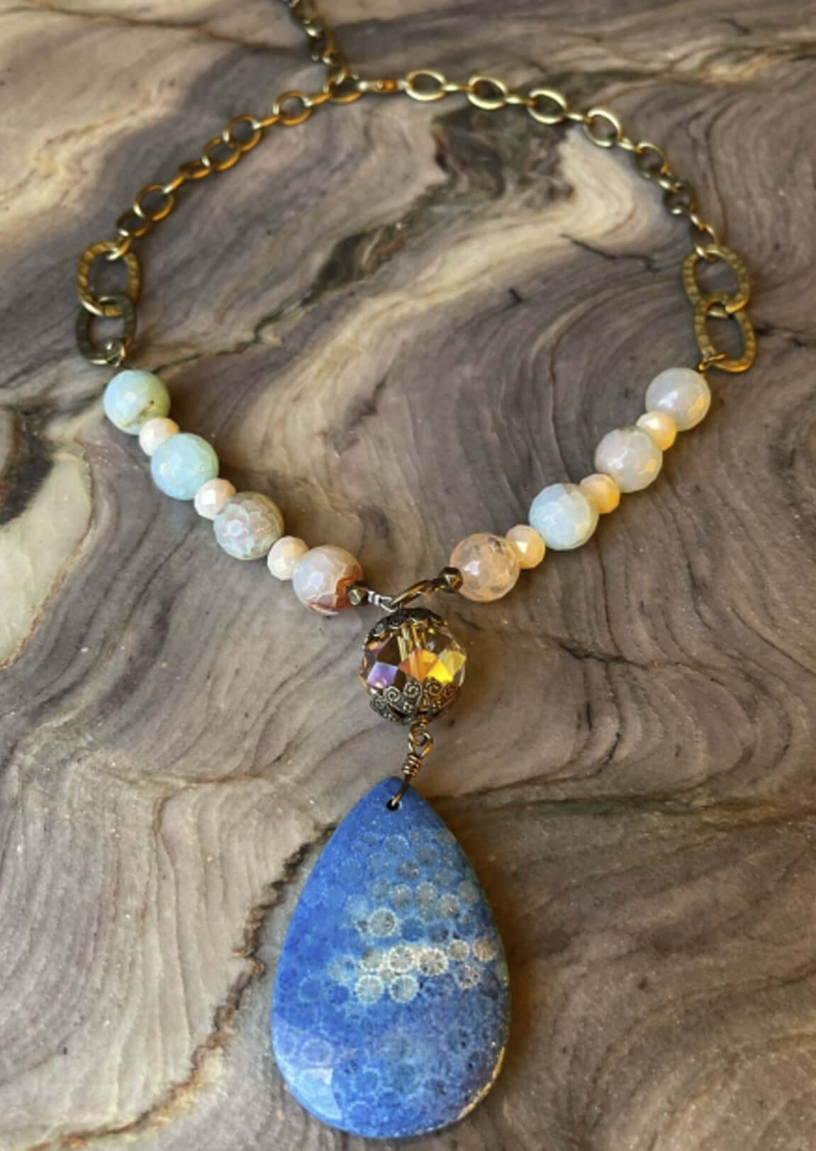 Ladies Fossil Imprinted Natural Blue Stone Statement Necklace. Handmade in USA, This beautiful piece is an adjustable length.