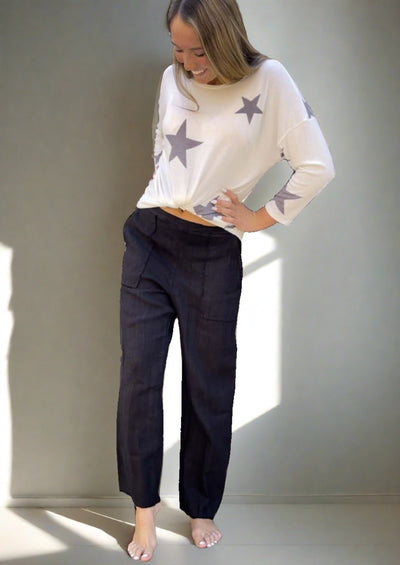 Proudly Made in USA, These Ladies 100% linen slouchy black pants are a spring & summer "Must-Have"! Frayed at Hem, Side Pockets, Baggy Fit | Classy Cozy Cool Women's Made in America Boutique