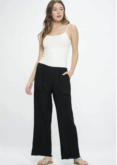Proudly Made in USA, These Ladies 100% linen slouchy black pants are a spring & summer "Must-Have"! Frayed at Hem, Side Pockets, Baggy Fit | Classy Cozy Cool Women's Made in America Boutique