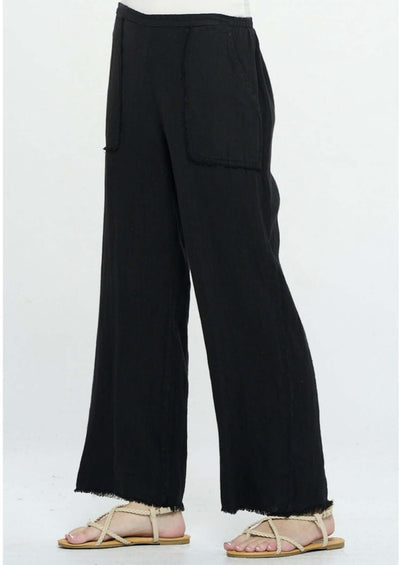 Proudly Made in USA, These Ladies 100% linen slouchy black pants are a spring & summer "Must-Have"! Frayed at Hem, Side Pockets, Baggy Fit | Classy Cozy Cool Women's Made in America Boutique